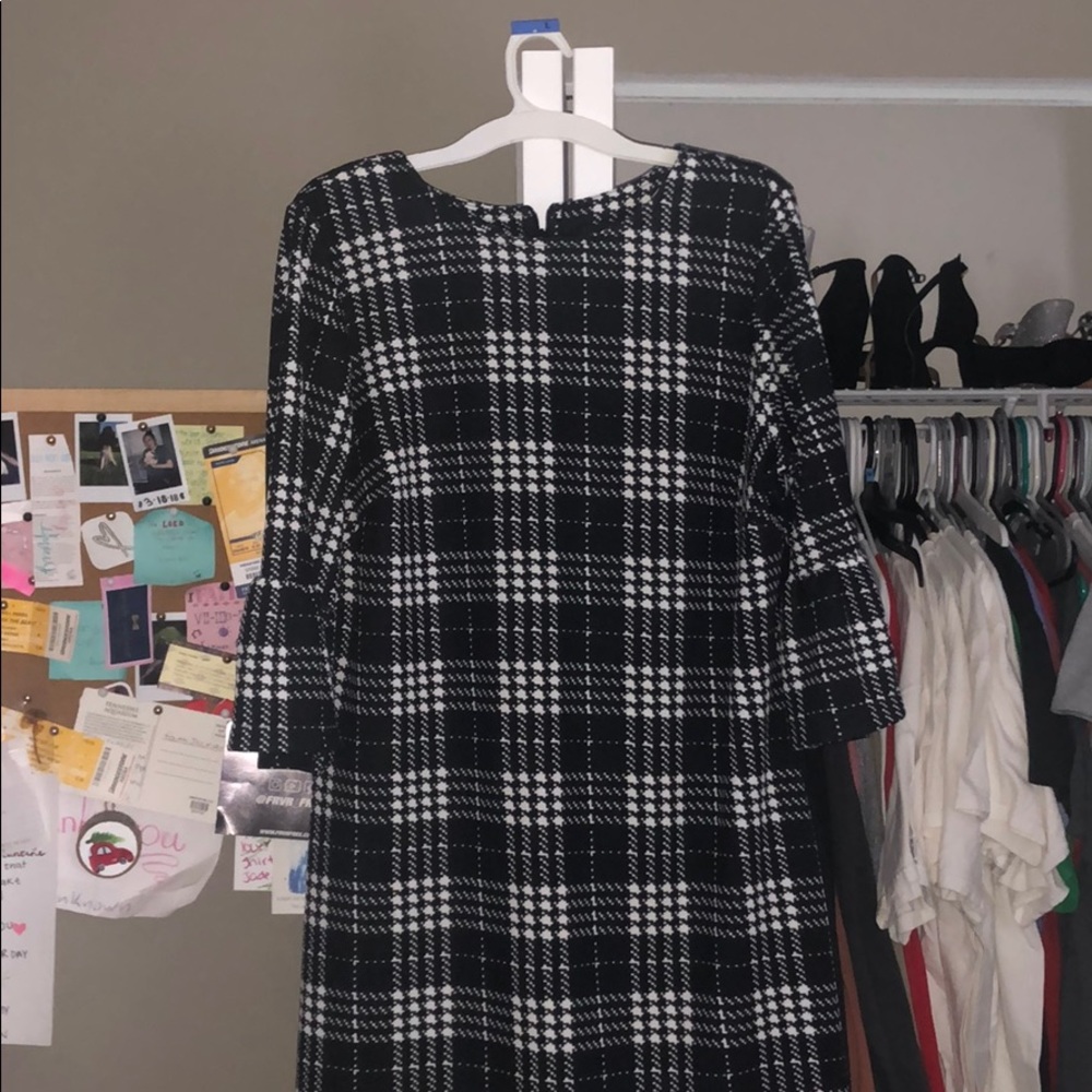 White and black patterned dress.